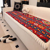 Quilted sofa throw with oriental pattern